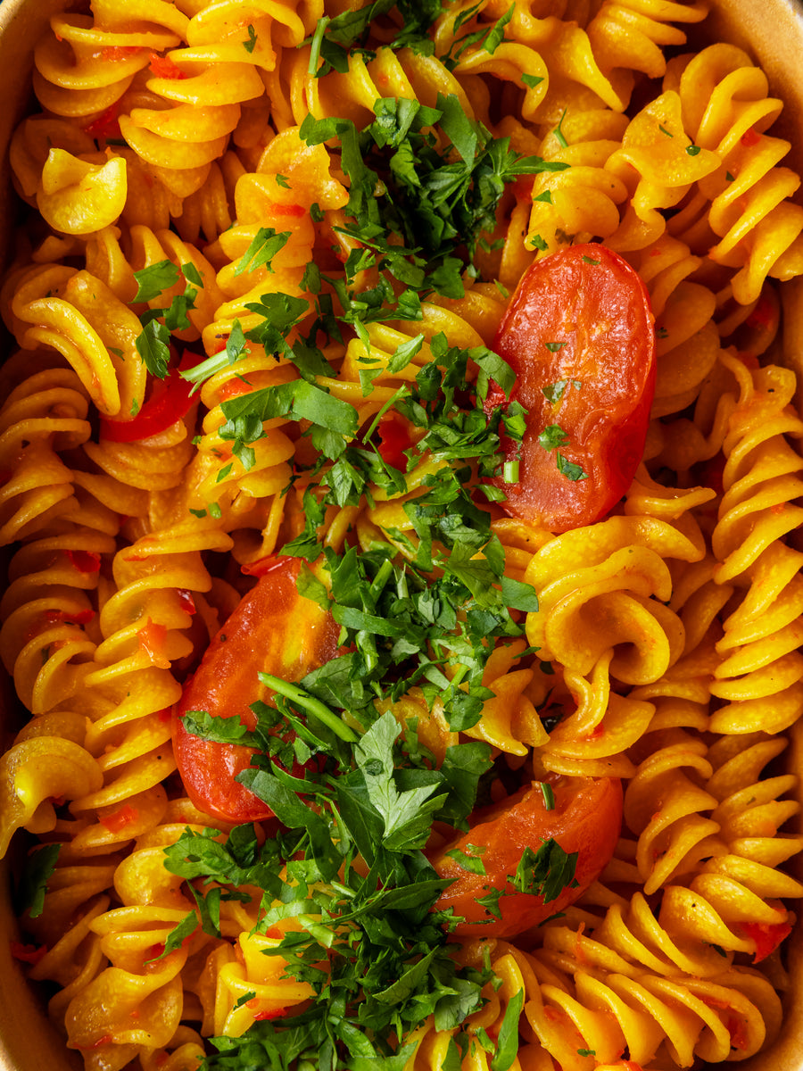 Fusilli in tomato sauce with fresh herbs, cooked to order at Bigoli