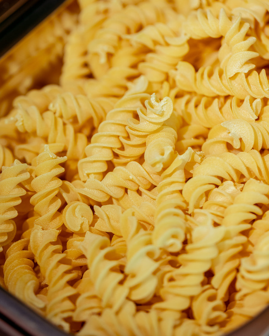 Close-up of raw fresh fusilli at Bigoli, still dusted with flour.